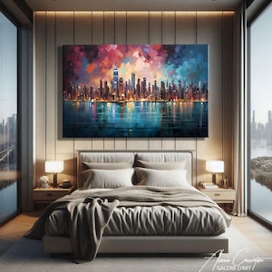 NYC skyline canvas print featuring a stunning panoramic view of Manhattan's illuminated skyscrapers at night reflected on a calm teal water surface, set beneath a dramatic mosaic-style expressionist sky of deep red, purple, rose and electric blue palette knife brushstrokes creating a vibrant jewel-toned canopy above the glittering city lights. Bold cubist-inspired painting style with rich multicolored tones on a dark background. Premium fine art canvas handcrafted in Germany.