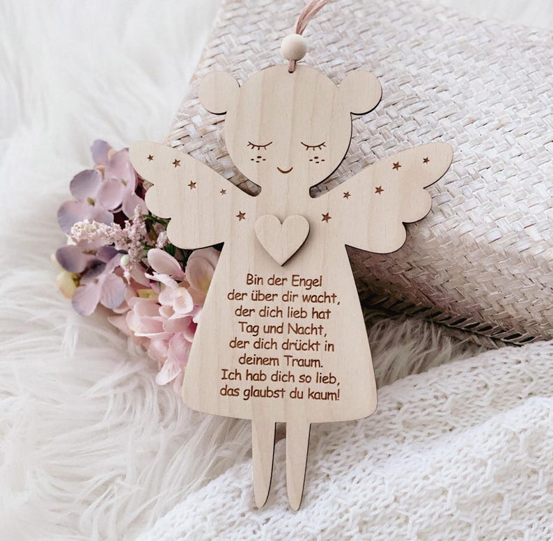 Guardian angel made of wood with prayer for girl.