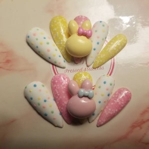 Super cute pink yellow and matte white with polka dots and bunny charms Easter press on nails