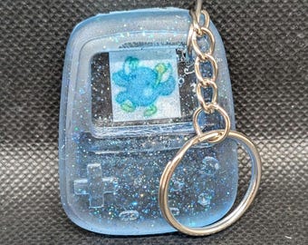 Tamagotchi Gioco Portachiavi con personaggio Urayattatchi