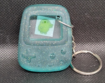 Tamagotchi Gioco Portachiavi con personaggio Kuchipatchie