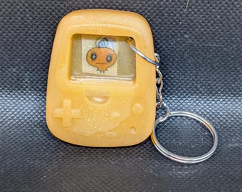Portachiavi con personaggio Memetchi del gioco Tamagotchi
