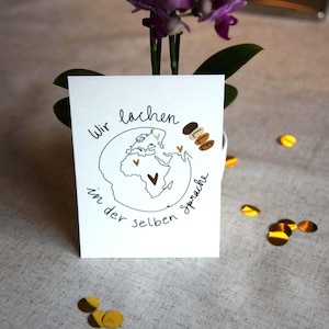 Postkarte "Wir lachen alle in der selben Sprache" | A6 | Naturkarton| Hochformat|selbstdesignt| gegen Rassismus| Vielfalt| Weltkarte