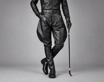 May include: Black leather jodhpurs featuring a high-waisted design with a belt, zippered side pockets, and flared thighs that taper toward the calves. The garment is paired with a matching black leather shirt, gloves, and black leather shoes.
