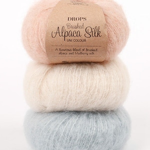 Hilo de seda de alpaca cepillada DROPS: Grosor Aran esponjoso, tejido suave.