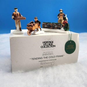 Department 56 Heritage Village &quot;Trending The Cold Frame&quot; Bachman&#39;s #2208 Dept.56 Accessories/Figurine. Christmas Village Display