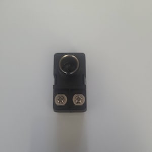 May include: Black plastic coaxial cable splitter with two female F-type connectors and one male F-type connector.