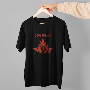 Best Selling Soilwork Stabbing The Drama In Flames Raunchy Heavy Cotton Men&#39;s Unisex Tshirt Size Usa
