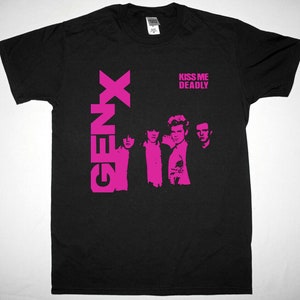 May include: Black t-shirt featuring a pink graphic of the band Gen X and the text "Kiss Me Deadly".