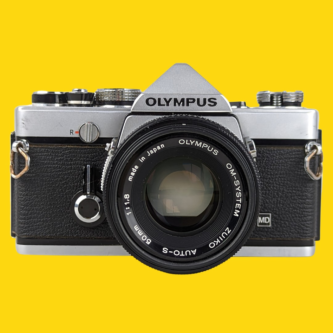 Olympus OM 1 Vintage 35mm SLR Film Camera With F/1.8 50mm Olympus OM 1 Vintage 35mm SLR Film Camera With F/1.8 50mm