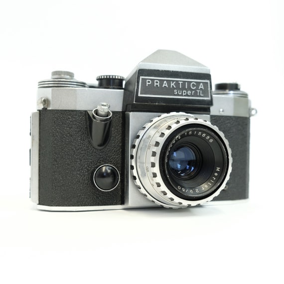 A lot of 4 single-lens reflex cameras: a Praktica MLT 3, a
