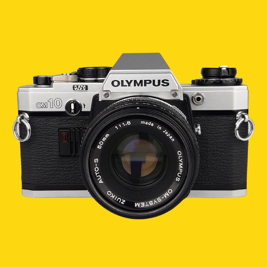 オリンパス OM10 SLR 35 mm フィルムカメラ、f/1.8 50 mm オリンパス OM10 SLR 35 mm フィルムカメラ、f/1.8 50 mm