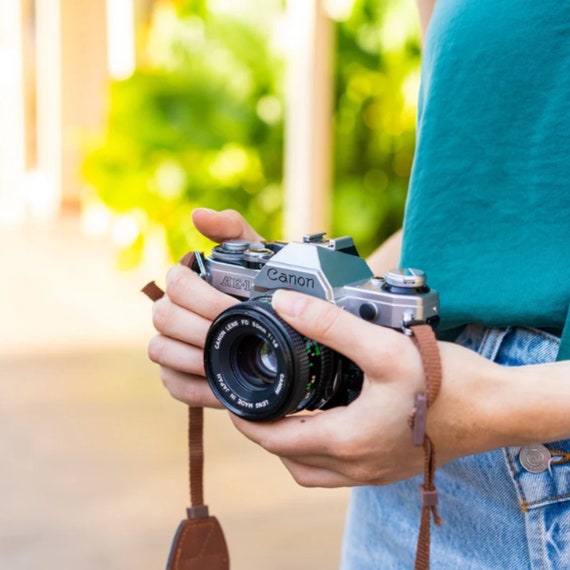 Canon AE-1 35mm SLR Film Camera With Canon Prime Lens - Etsy Canon AE-1 35mm SLR Film Camera With Canon Prime Lens - Etsy