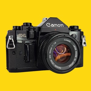 Canon A1 Vintage SLR 35mm Film Camera with f/1.8 50mm Prime Lens - Retro Film Cameras
