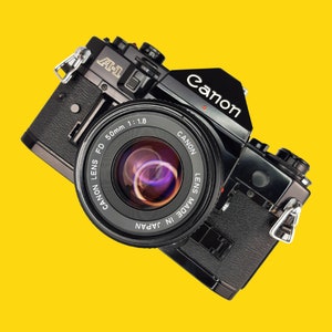 Canon A1 Vintage SLR 35mm Film Camera with f/1.8 50mm Prime Lens - Retro Film Cameras