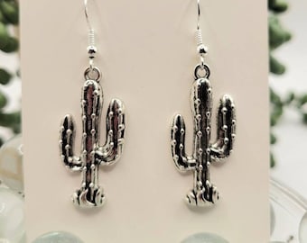 Saguaro cactus earrings. Silver or gold tone.