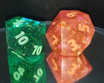 The Biggest Mix-Up - 48mm - (D10) Translucent Orange w/Foil Bits (D100) Translucent Green w Foil Bits - Percentile Dice Set – Chonks