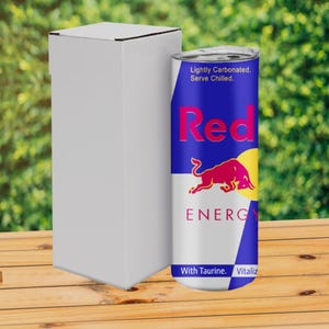 May include: A blue and white can with a red bull logo and the text "Red Bull Energy Drink" and "Lightly Carbonated. Serve Chilled."  The can also has the text "With Taurine. Vitalizes."