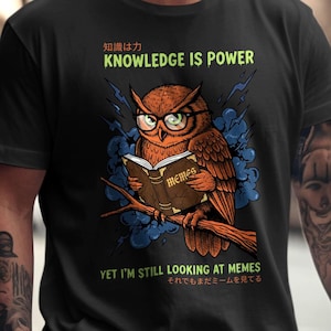 Owl wearing glasses reading a book titled "MEMES" with text "Knowledge is Power".