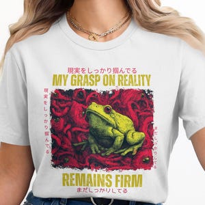My Grasp On Reality Remains Firm Frog T-Shirt, Funny Graphic Tee, Cute Frog Shirt, Statement Frog Tee, Novelty Gift Idea, Cool Frog T-Shirt