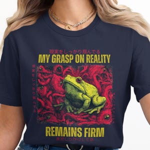 My Grasp On Reality Remains Firm Frog T-shirt, Funny Frog Tee, Unisex Graphic Tee, Cute Frog Lover Gift, Casual Frog Shirt