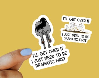 May include: Two stickers with a humorous saying about getting over things. The first sticker features a cartoon horse with its rear end facing the viewer. The second sticker features a cartoon dog lying on its back. Both stickers have the text "I'll get over it, I just need to be dramatic first."