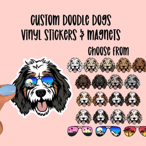 May include: Custom doodle dog vinyl stickers and magnets. Choose from a variety of doodle dog designs with different fur colors and sunglasses. The sunglasses have different designs including mountains, palm trees, and a sunset.