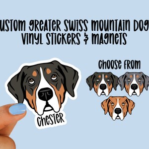 May include: Custom vinyl stickers and magnets featuring Greater Swiss Mountain Dogs. Choose from three different color variations: black and tan, gray and tan, and brown and tan. The sticker in the image is personalized with the name "Chester".