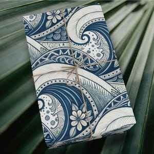 May include: Blue and white patterned wrapping paper with a wave design. The paper is tied with twine.