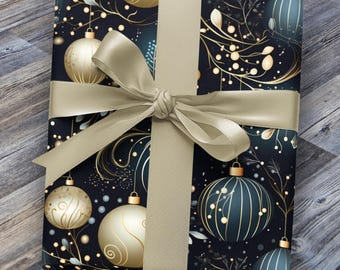 May include: A gift box wrapped in black and gold Christmas wrapping paper with a pattern of ornaments and branches. The box is tied with a beige satin ribbon.