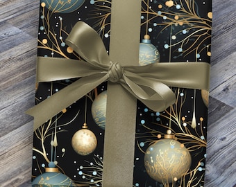 May include: A black gift wrap with a gold and blue ornament pattern. The gift is wrapped with a green ribbon.