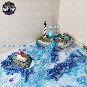May include: A display of 3D-printed fantasy creatures, including a blue Water Chinese Dragon, a Sea Serpent with a lighthouse, and a Water Crystal Dragon. The scene is set on a blue surface with scattered crystal-like accents.
