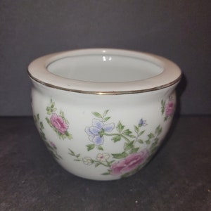 Miniature Asian floral flowerpot.
