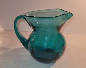 Teal blue blown glass small pitcher