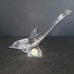 24% lead crystal dolphin.  Made in France