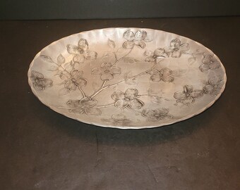Wendell August  hammered aluminum oval dish with dogwood flowers