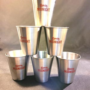 9 stainless steel "Kahlua Midnight " shot glasses