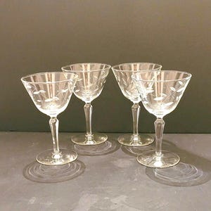 Vintage windswept champagne glasses by Libbey
