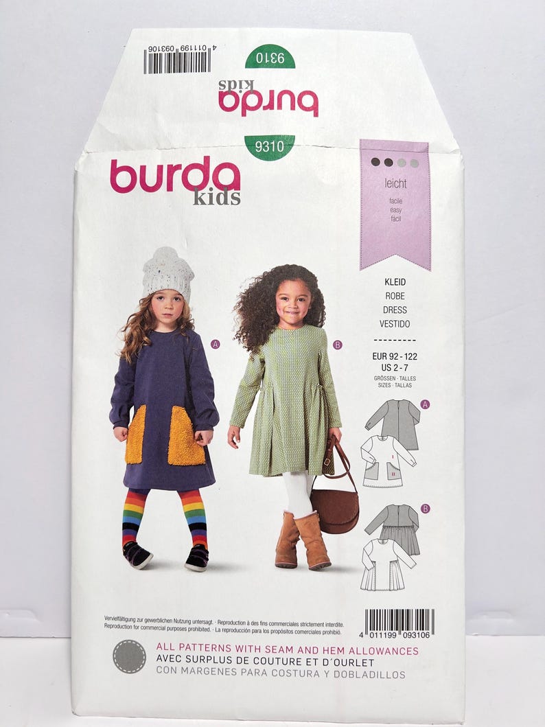 Pode incluir: Um pacote de padr&otilde;es de costura Burda Kids com ilustra&ccedil;&otilde;es de vestidos infantis. O pacote inclui o logotipo Burda Kids, o n&uacute;mero do padr&atilde;o 9310 e informa&ccedil;&otilde;es de tamanho para EUR 92-122 e US 2-7. O pacote tamb&eacute;m inclui o texto "ALL PATTERNS WITH SEAM AND HEM ALLOWANCES".