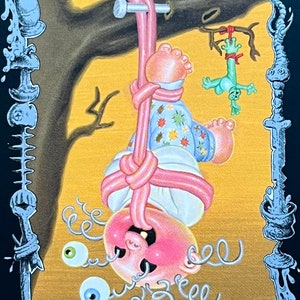 May include: A tarot card illustration depicting The Hanged Man. The card is set against a gold background with a black and white border. The Hanged Man is a cartoon figure with a pink head and body, hanging upside down from a tree branch. The figure is tied with a pink rope and has large eyes. The card number XII is displayed in the top right corner.