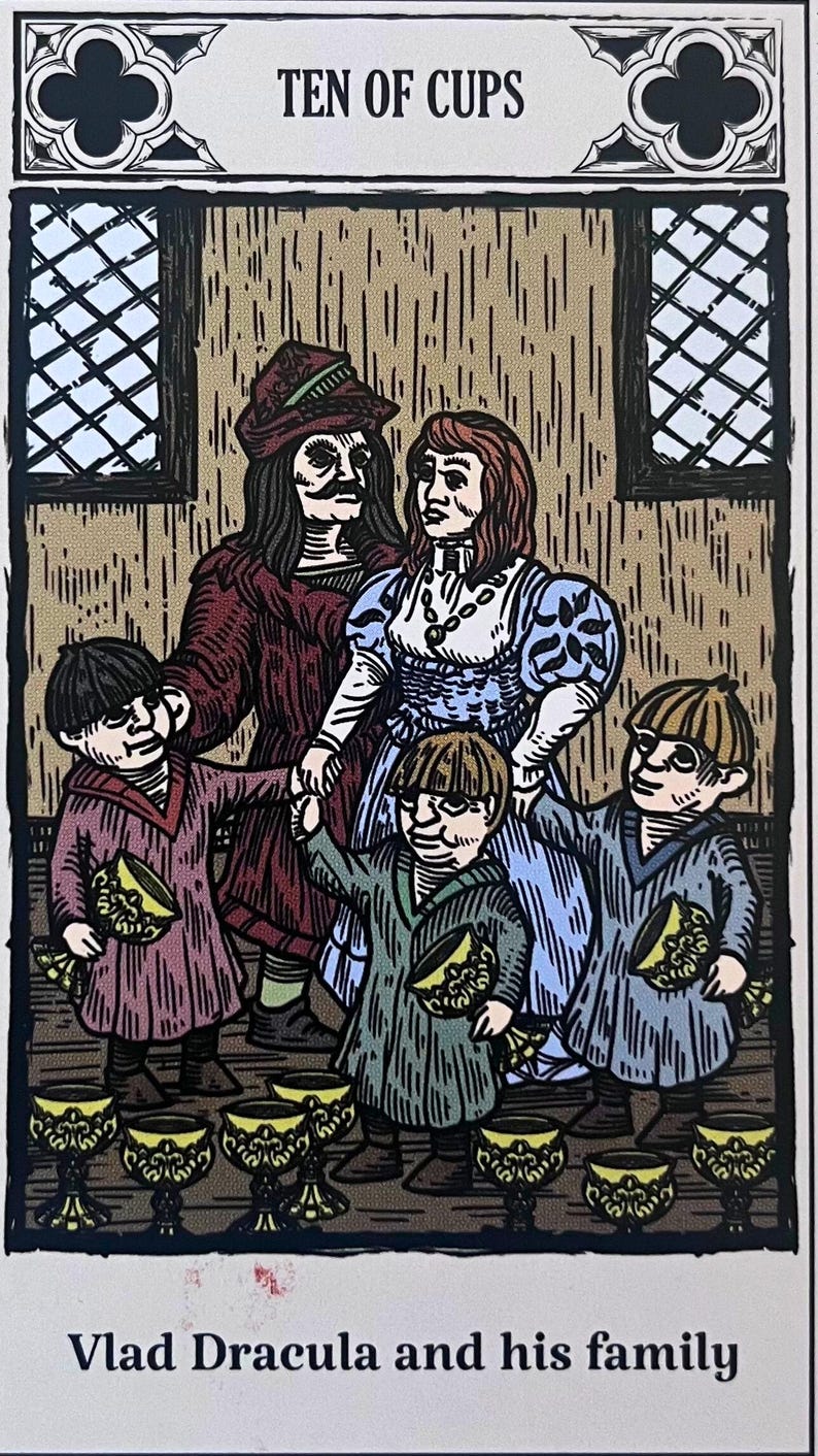 May include: A vintage tarot card illustration depicting the Ten of Cups card. The card features a family of five, including a man, a woman, and three children, all holding golden cups. The card is titled "Ten of Cups" and has the text "Vlad Dracula and his family" at the bottom.