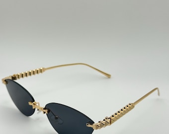 Rimless Cat-Eye Sunglasses: Gold Pyramid Arms, Polarized UV400 Shades