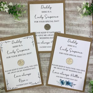 May include: Three white cards with brown paper backing, each with the text "Daddy Here is a Lucky Sixpence for your special day!" and a silver coin attached. The cards also include the text "Please keep it safe until you give me away on my wedding day. Love always [Name] x [Date]"