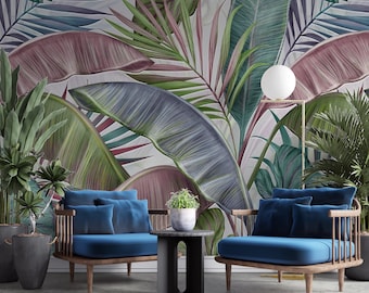 May include: Two blue velvet armchairs with wooden frames sit in front of a wall with a tropical leaf patterned wallpaper. A small black table with a potted plant sits between the chairs.