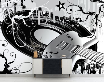 May include: Black and white graphic design featuring a vinyl record, a guitar, and floral elements. The design is set against a white background.