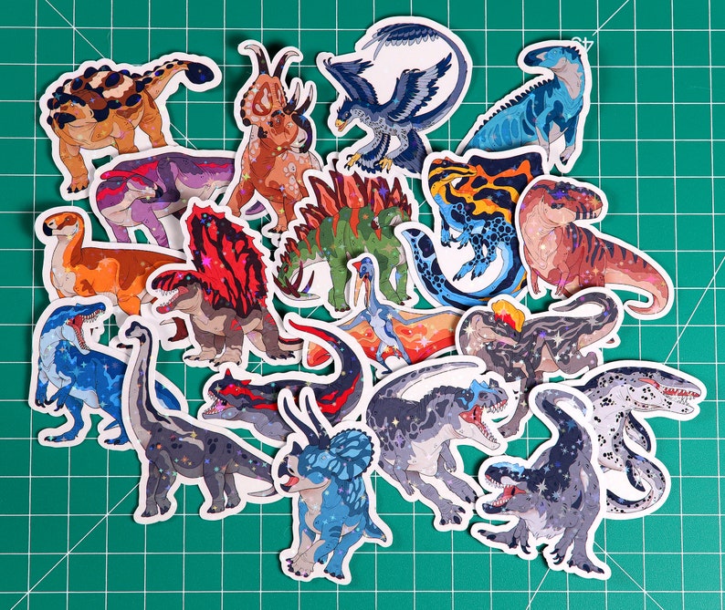 May include: A collection of colorful dinosaur stickers featuring various species, including a T-Rex, Triceratops, Stegosaurus, and Pterodactyl. The stickers are perfect for adding a prehistoric touch to any project.
