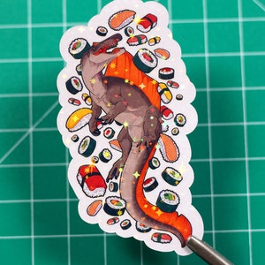 Pegatina de Sushi Spinosaurus - Hecha a mano - Dinosaurio - Vinilo - Brillo brillante