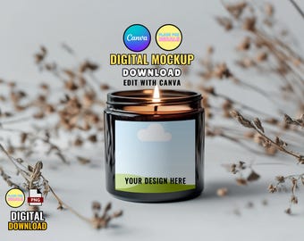 May include: A brown glass candle jar with a white label that says "YOUR DESIGN HERE". The candle is lit and the flame is visible. The candle is on a white surface with dried flowers in the background.