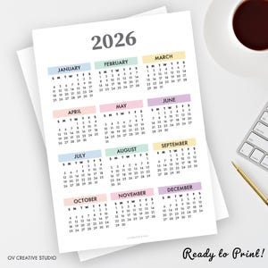 May include: A 2026 calendar with each month displayed on a separate page. The calendar features a pastel color scheme for each month, with the text "Ready to Print!" at the bottom.