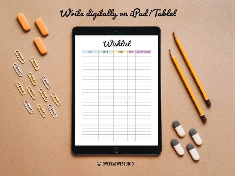May include: A digital tablet displaying a blank wishlist template with columns for item, brand, store, price, want it, and because. The tablet is on a brown surface with yellow pencils, orange erasers, and silver and gold paper clips.